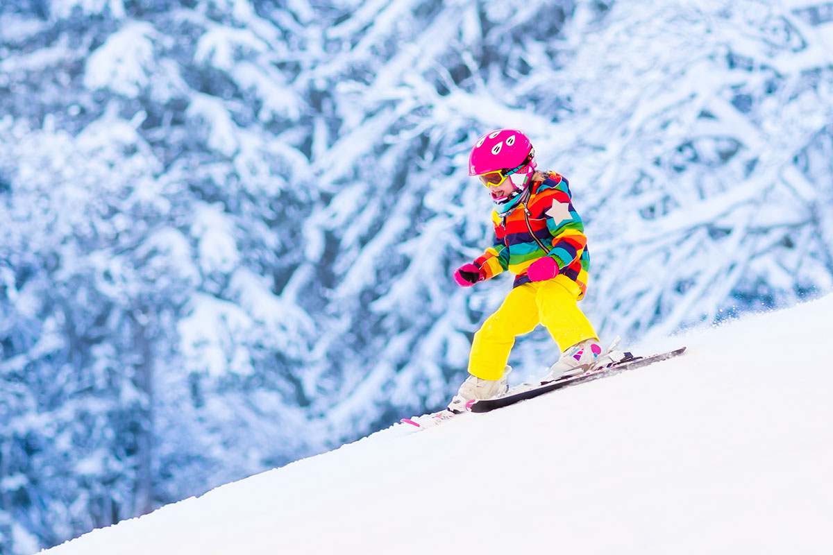 A learner skier makes their way down the slope