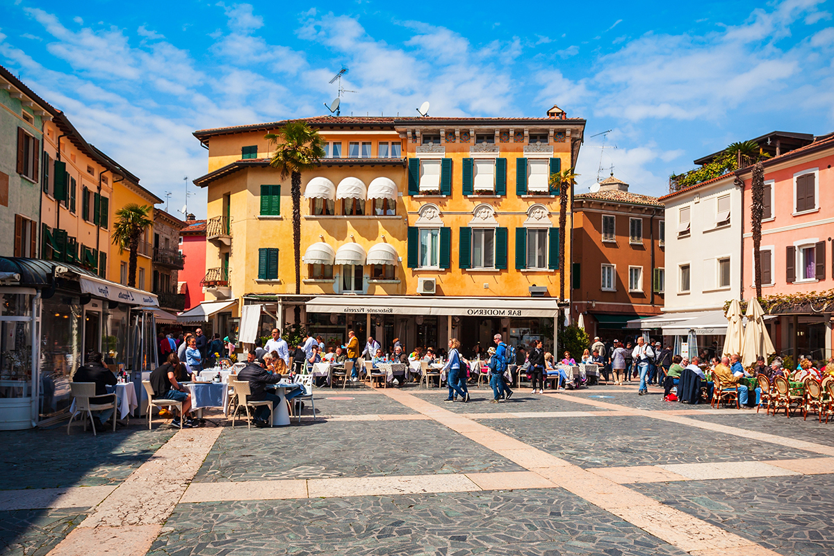 The famous Piazza Carducci brimming with café goers on a lovely day in Sirmione