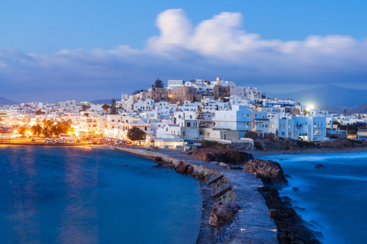 A panoramic view of the island of Naxos in Greece during a summer sunset