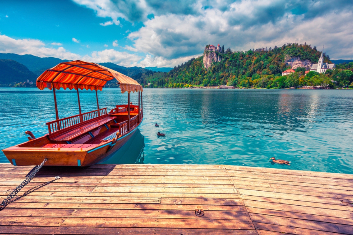 A pletna boat anchored at the Lake Bled pier 