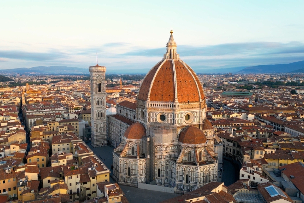 Aerial view of Florence Cathedral (Duomo di Firenze), Cathedral of Saint Mary of the Flower, sunset golden hour, Italy