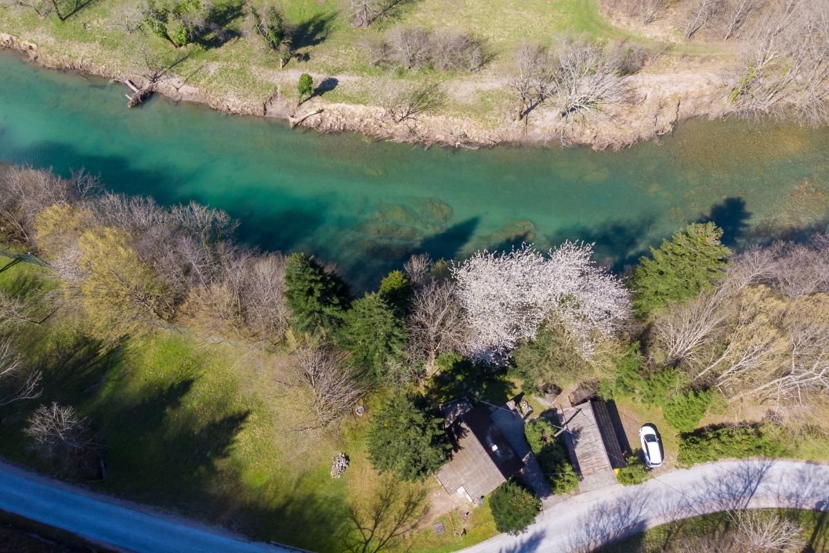 Aerial view of the turquoise waters of River Kolpa in the Slovenian countryside