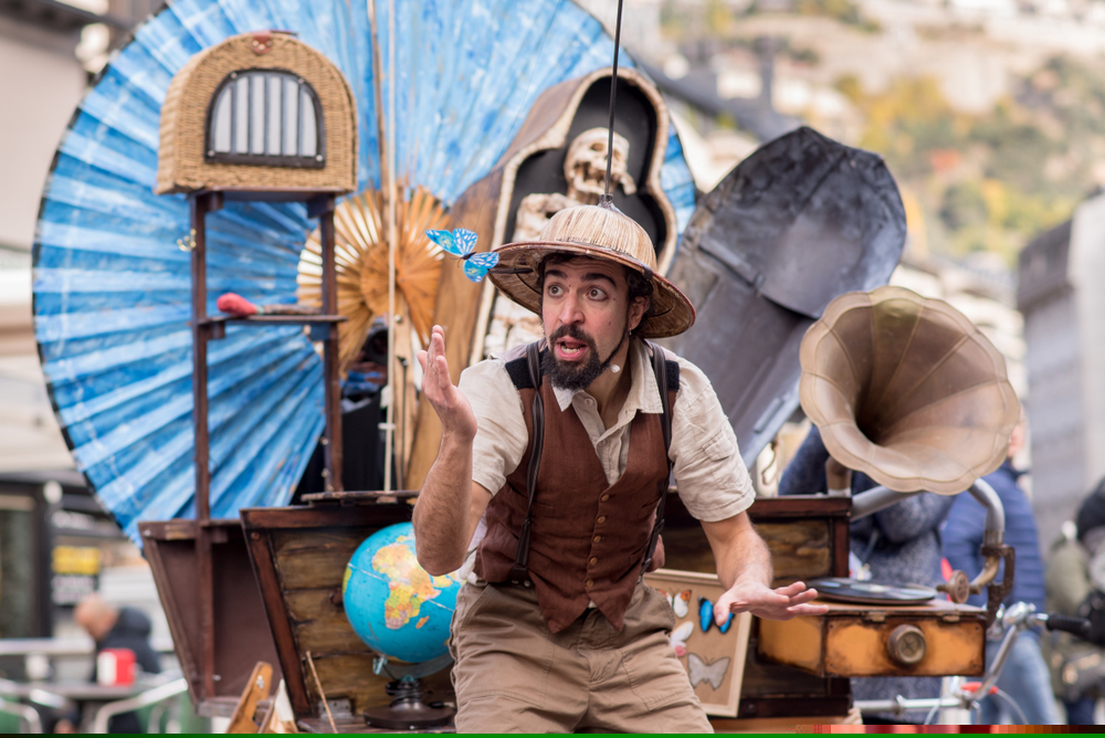 A street performer performing at Andorra Shopping festival