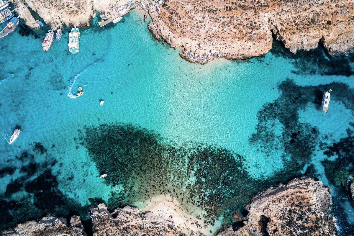 The famous Blue Lagoon with its crystal-clear waters in the Mediterranean Sea. Island of Comino, Malta