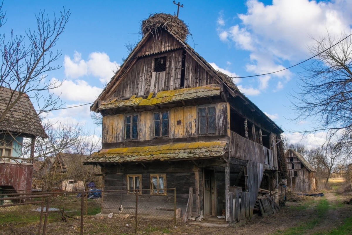 An abandoned historic wooden building in the small village of Cigoc Village in Sisak-Moslavina County
