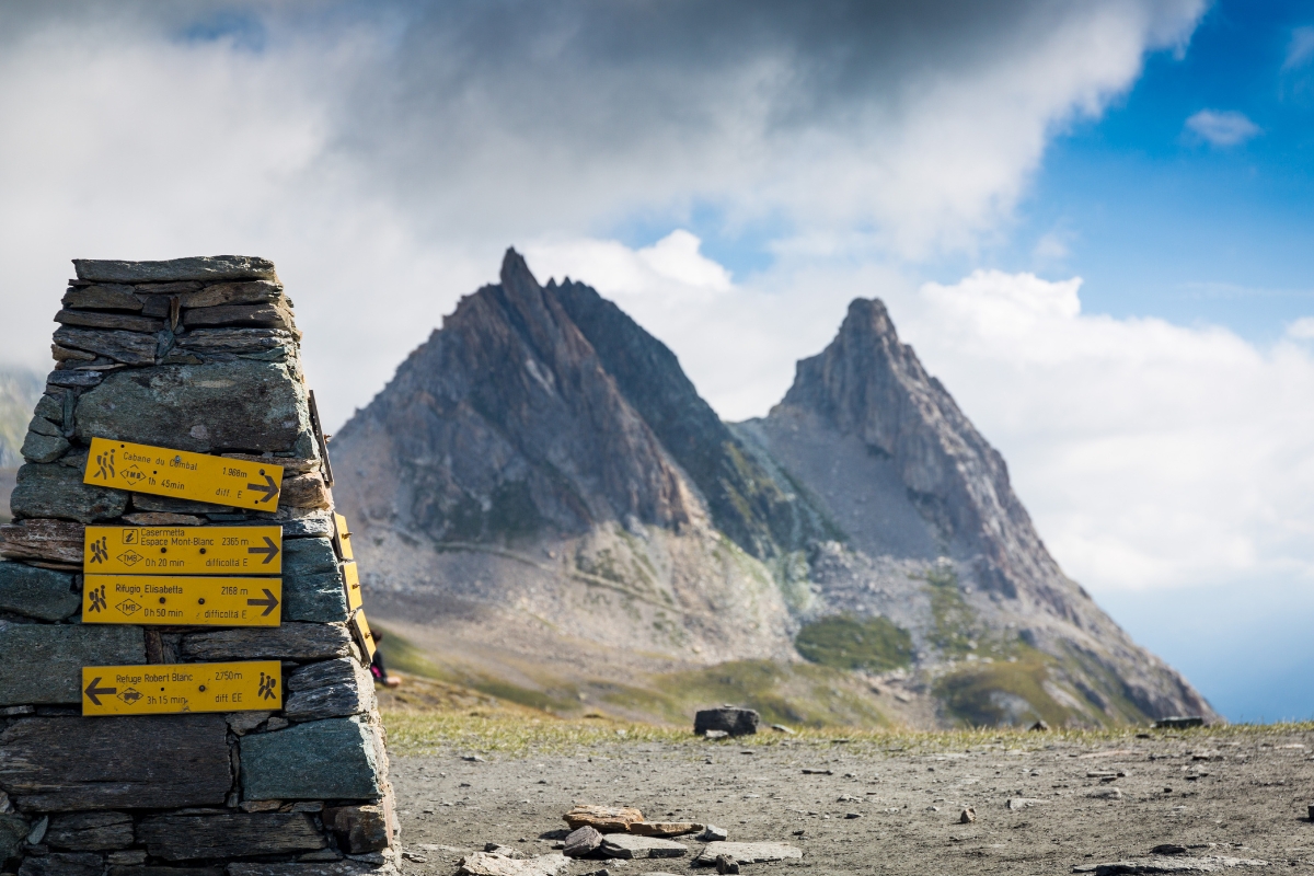 A trail of the Tour du Mont Blanc race, with the Mont Blanc massif in the background