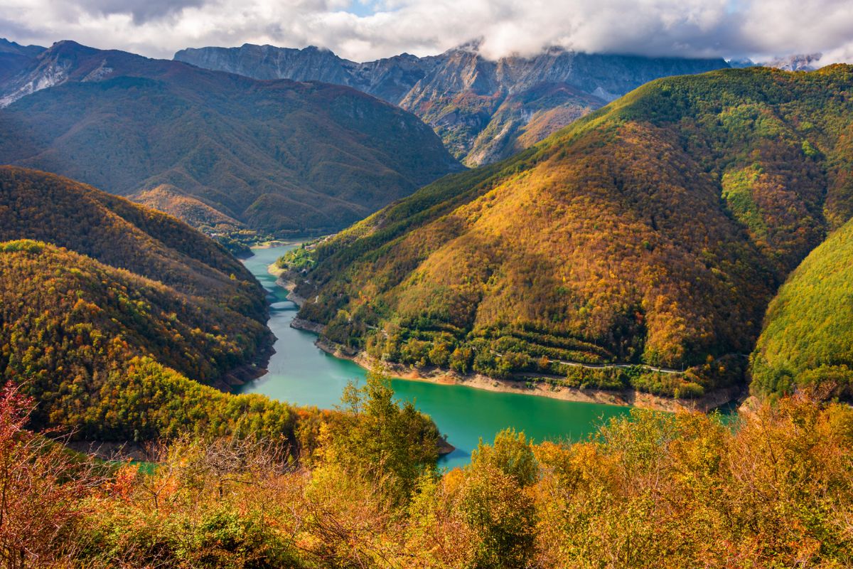 A panoramic view of the lake of Vagli in Garfagnana seen from the plateau of Careggine with the Apuan peaks in the background