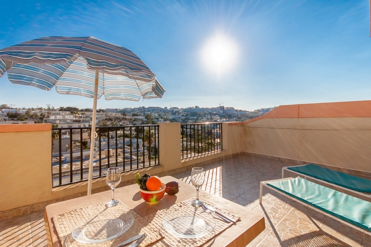 Happy.Rentals' terrace property on a sunny day in Malta, ID 6383