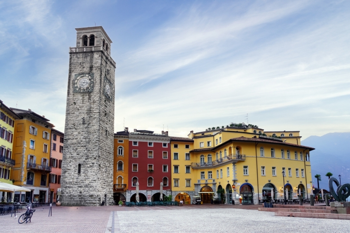 Riva del Garda, Italy. Old town and medieval tower Torre Apponale early in the morning.