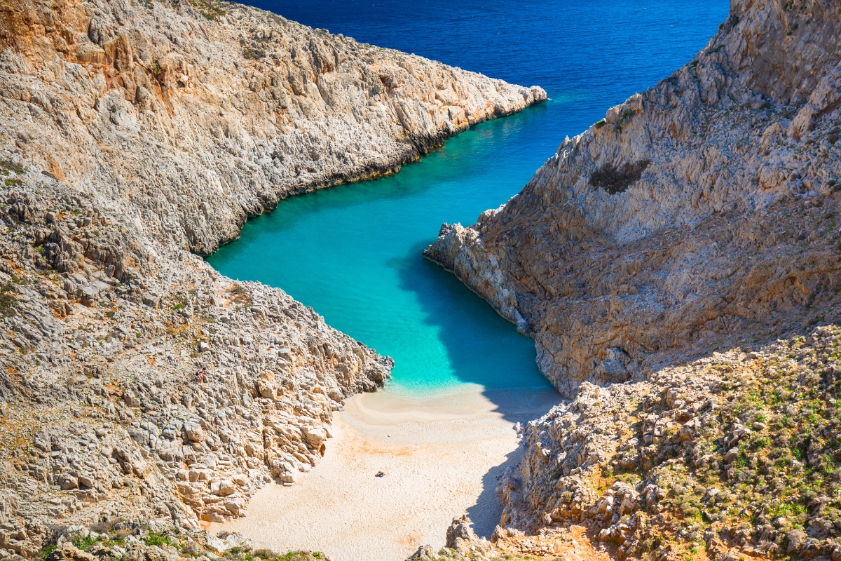 The blue waters and golden sand of Seitan Limania beach, Crete, Greece