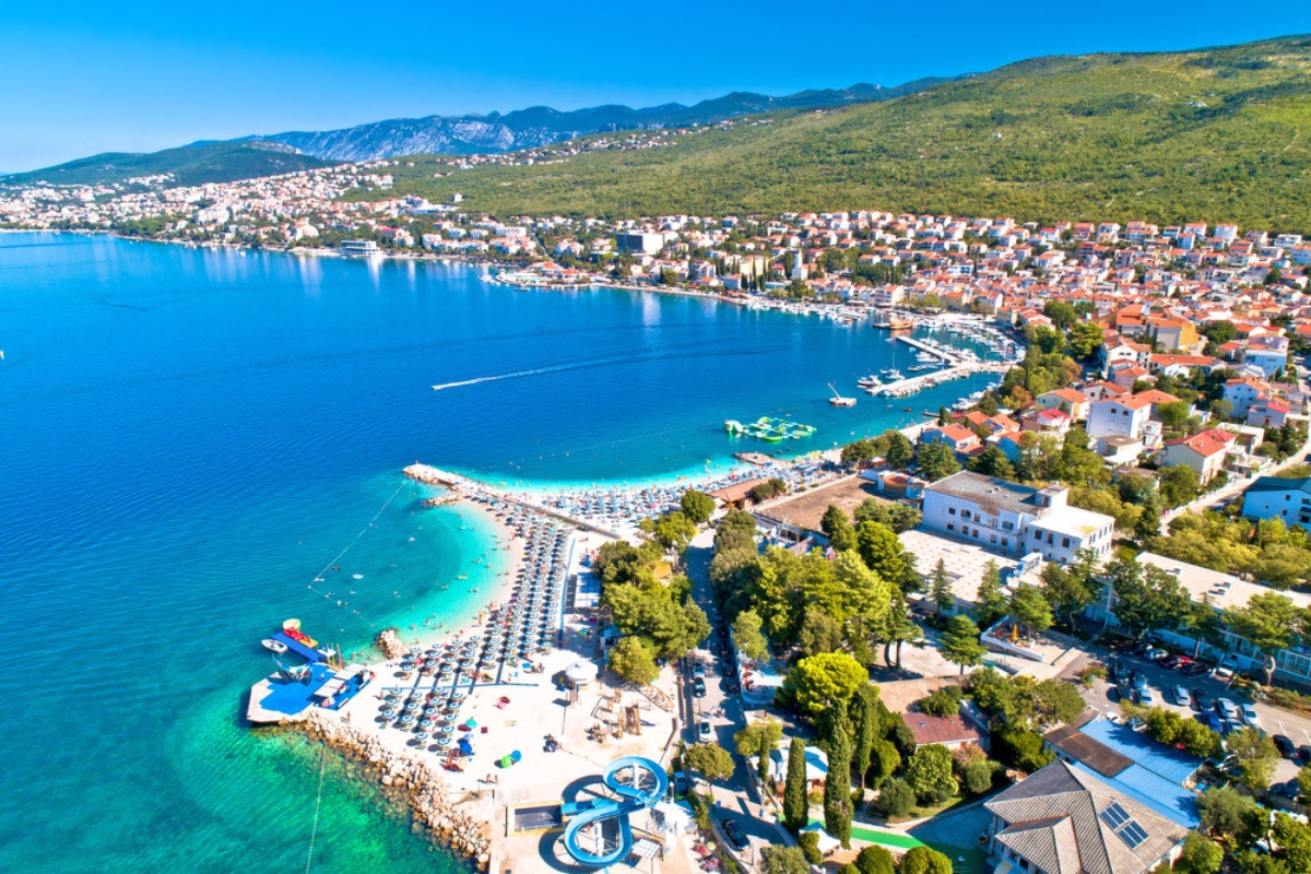 Selce and Poli Mora turquoise beach aerial view, Crikvenica riviera in Croatia
