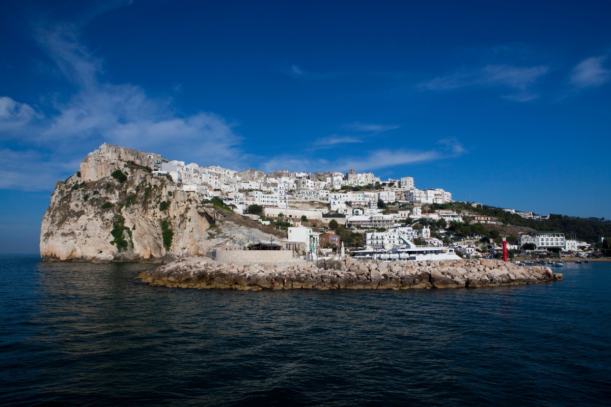 Coastal village of Peschici on the Gargano peninsula surrounded by blue waters