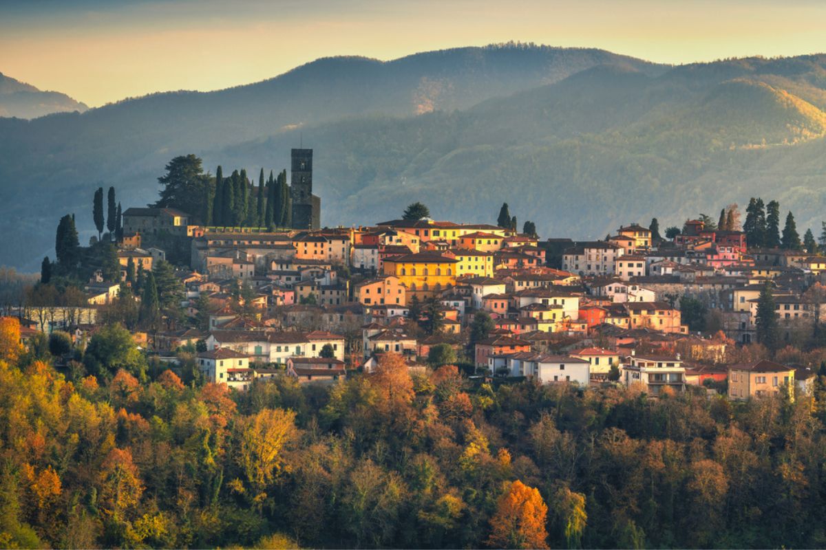 Barga medieval village at sunset in autumn. Garfagnana, Tuscany, Italy Europe