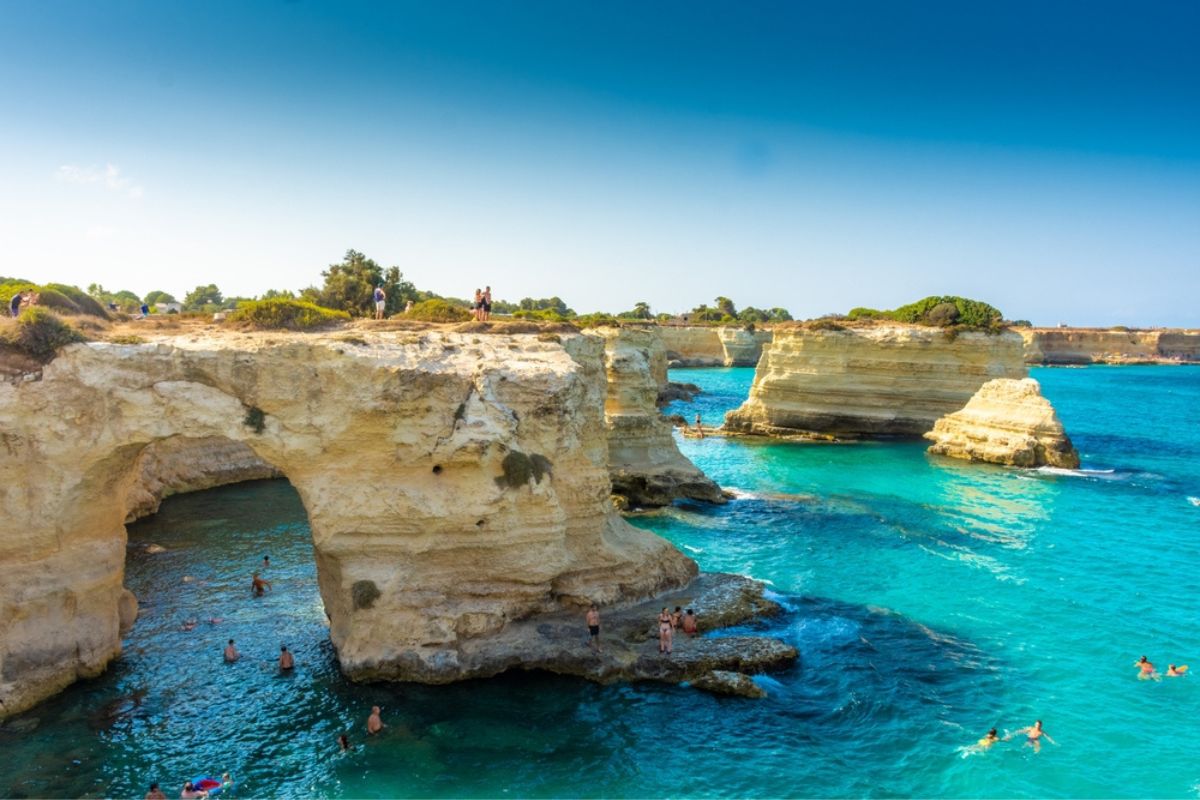 The beautiful crystal clear Sea of Puglia from the cliffs and the sea stacks of Sant'Andrea, Salento