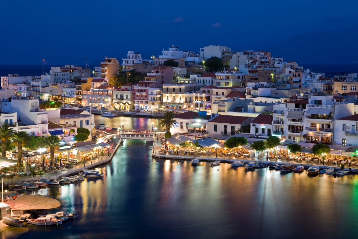 The stunning Agios Nikolaos harbour at night, Crete, Greece