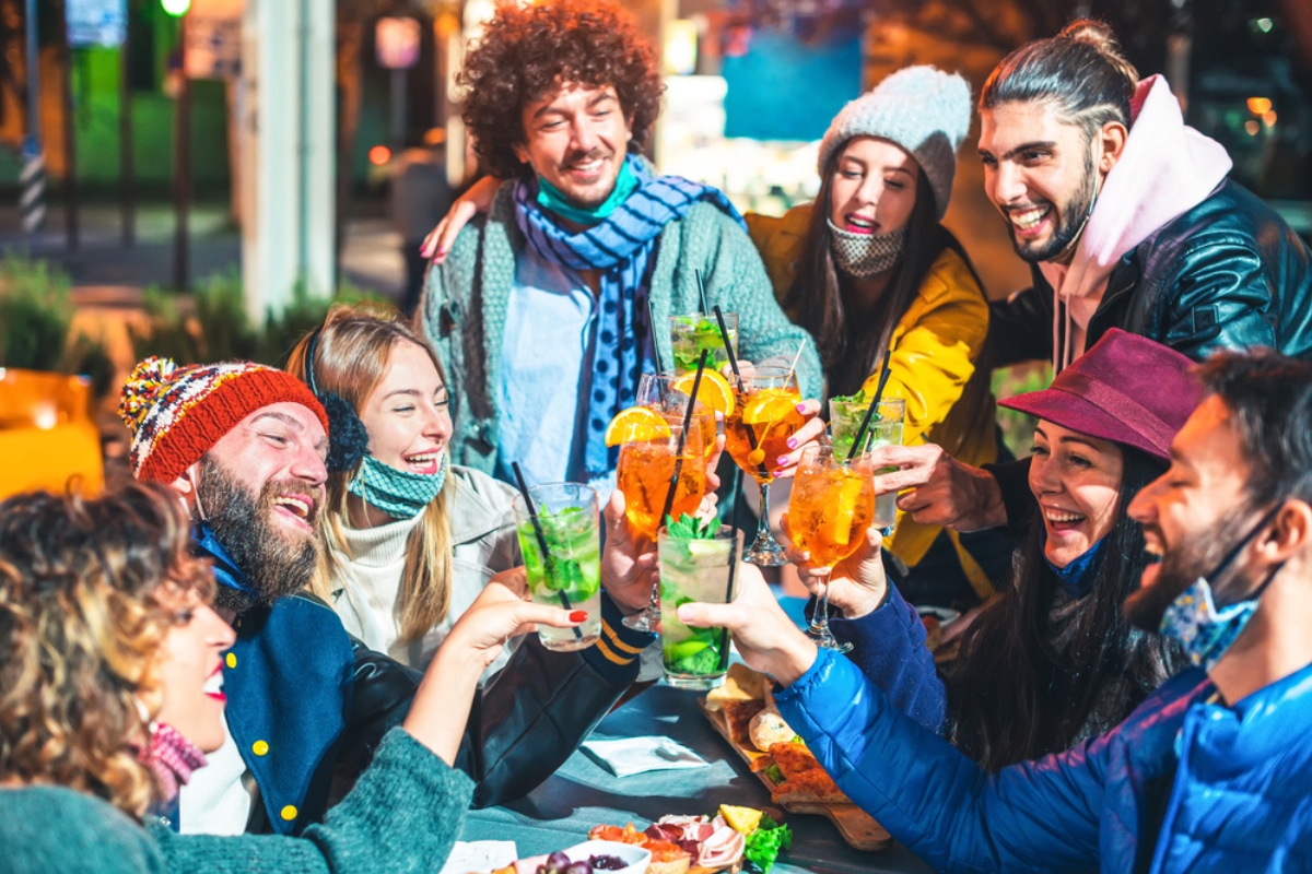 Young people having fun together at apres ski